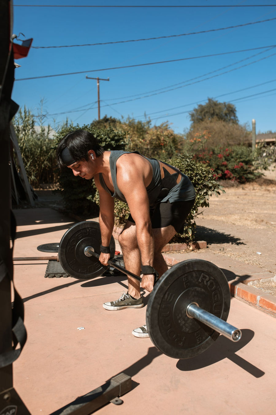 Athlete weightlifting outdoors, holistic fitness training for the Space Force assessment